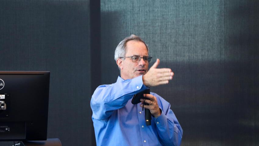 Man wearing glasses and a blue shirt