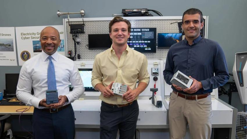 three researchers in a lab