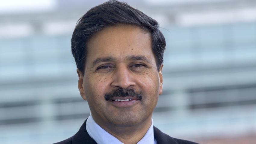 Portrait photo of a man smiling 