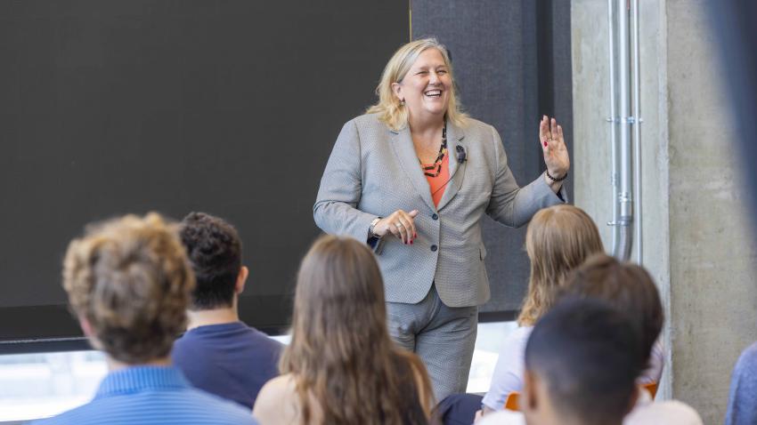 woman speaking to an audience