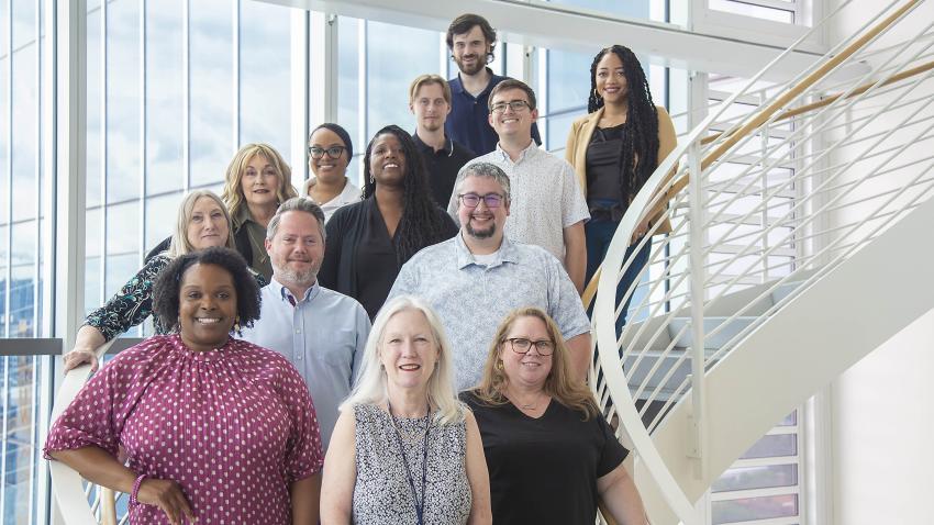 people standing on stairs