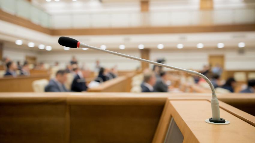 a photo of a podium in an auditorium 