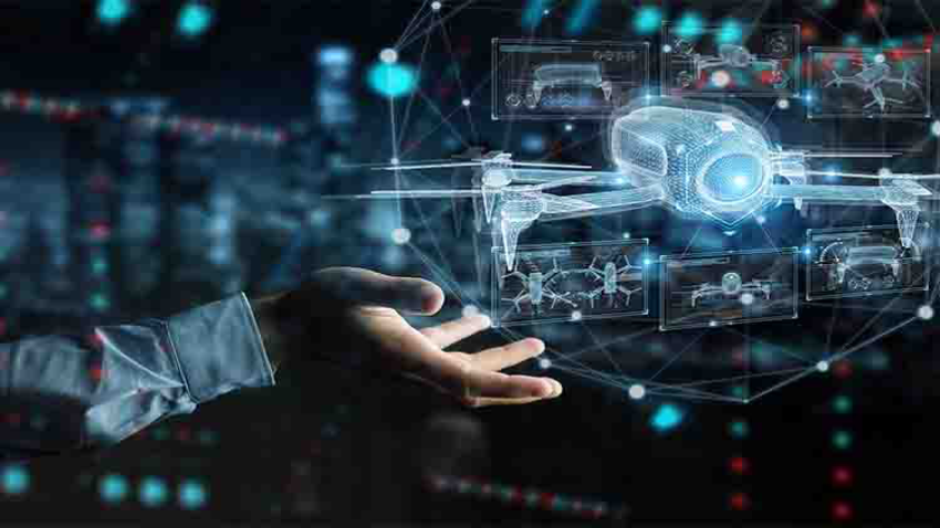 A hand below a hovering drone