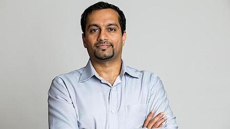 A photo of a man in a white button up shirt
