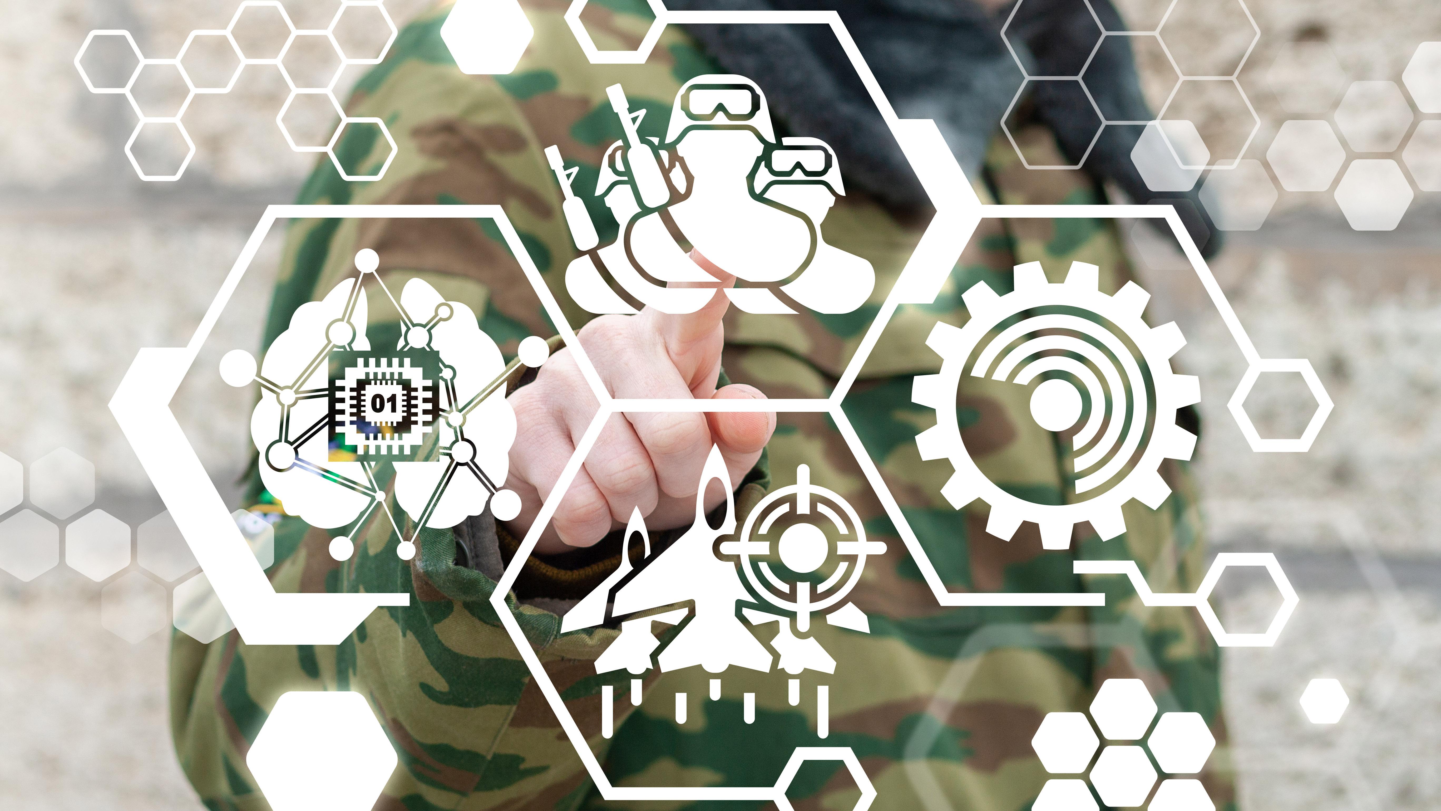 A hand hitting buttons indicating AI weaponry